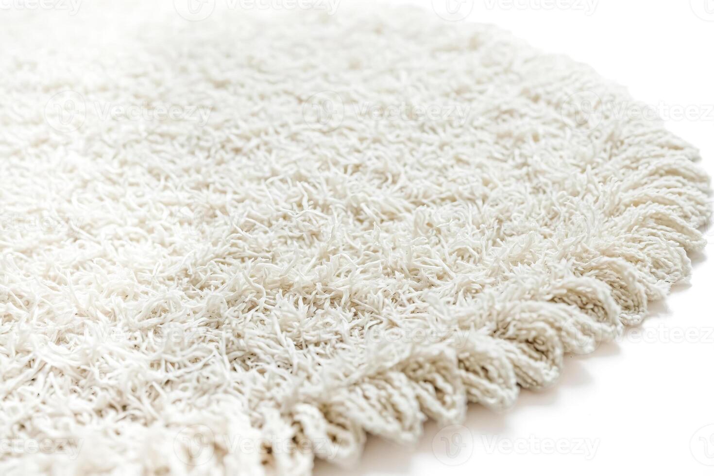 Close-up of Soft Fluffy White Shag Rug Texture photo