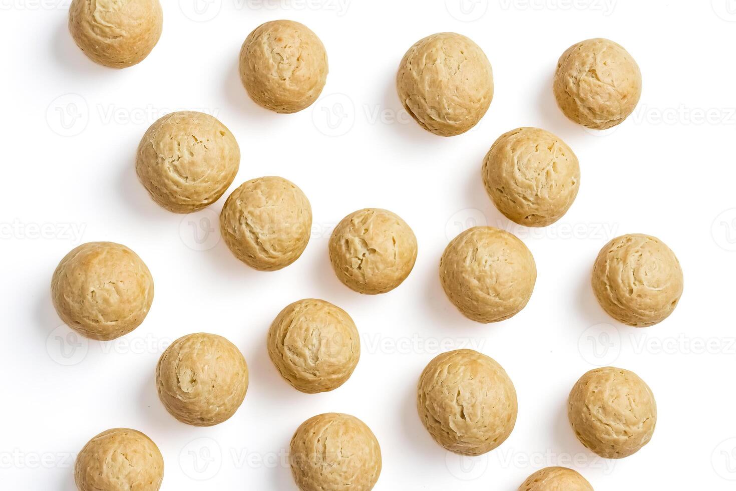 Scattered Cheese Balls on White Background photo