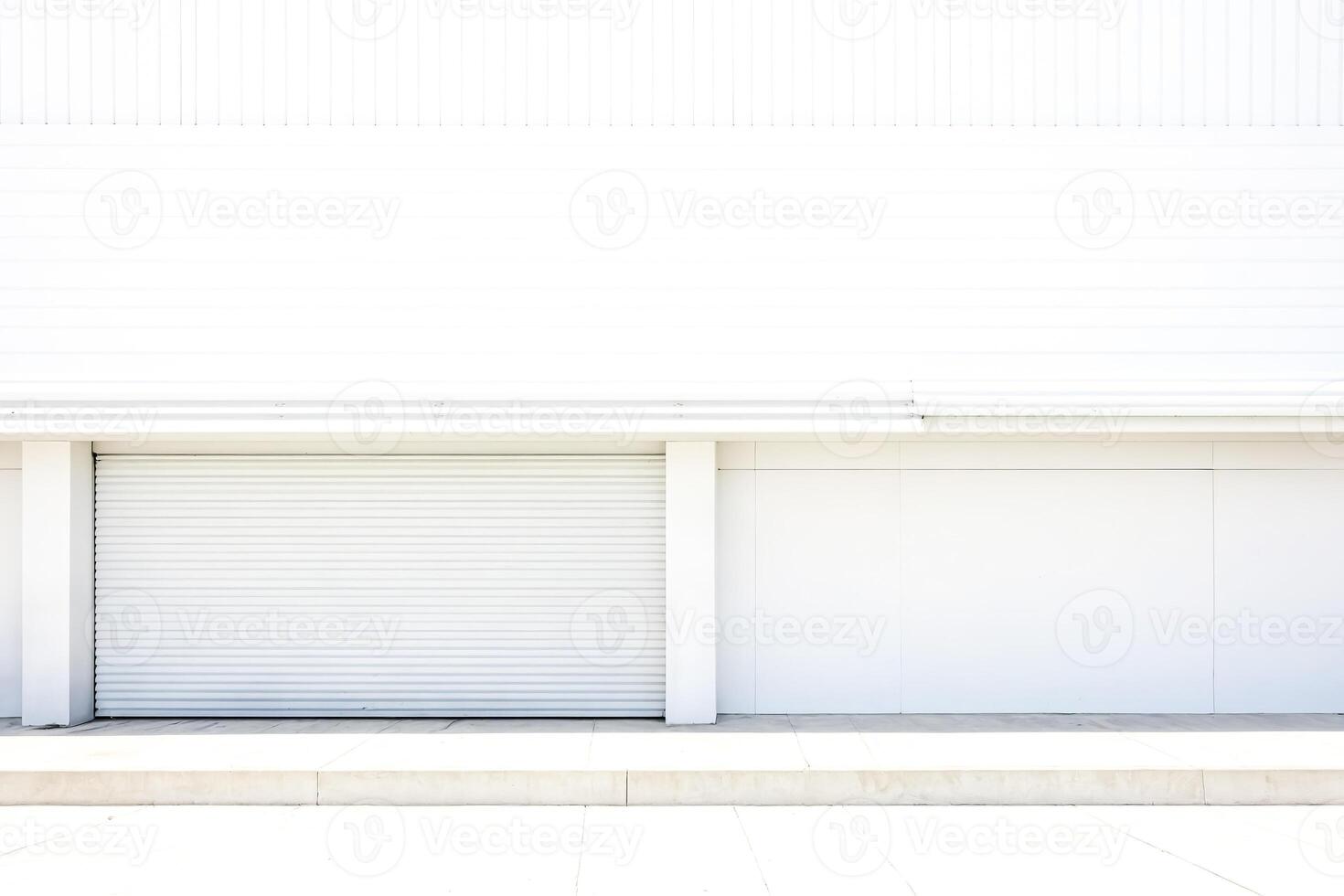 White Concrete Wall with Garage Door and Step photo
