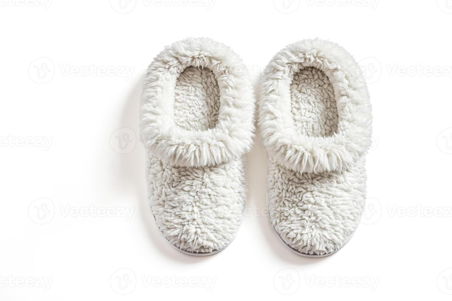 White Furry Slippers on White Background photo