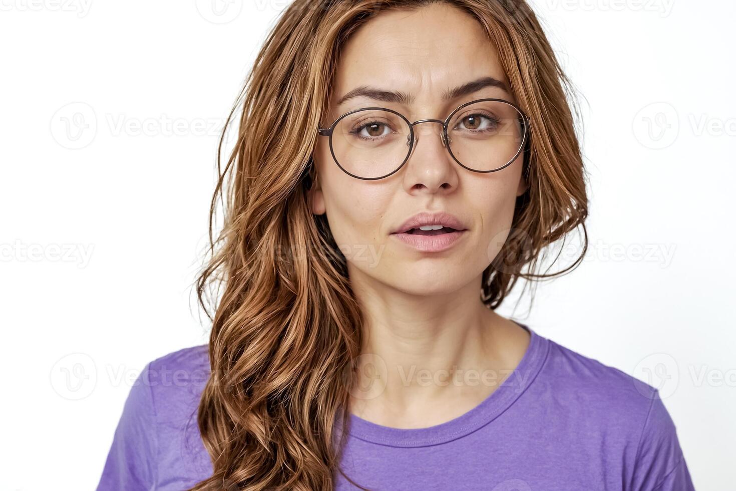 Portrait of a woman in glasses with a thoughtful expression photo