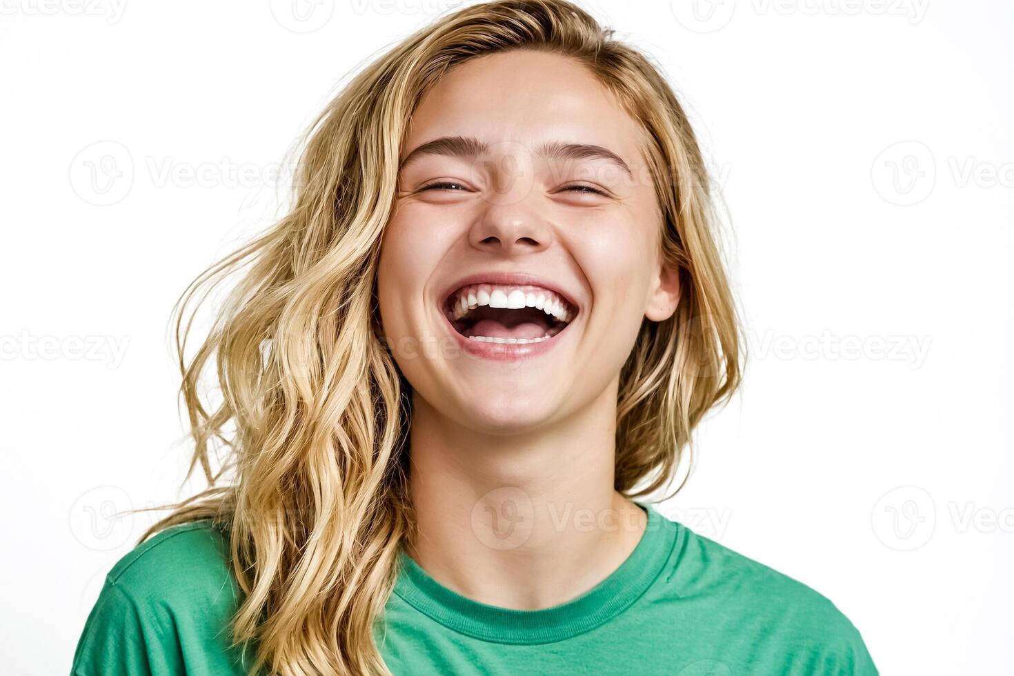 Portrait of a happy young woman laughing photo