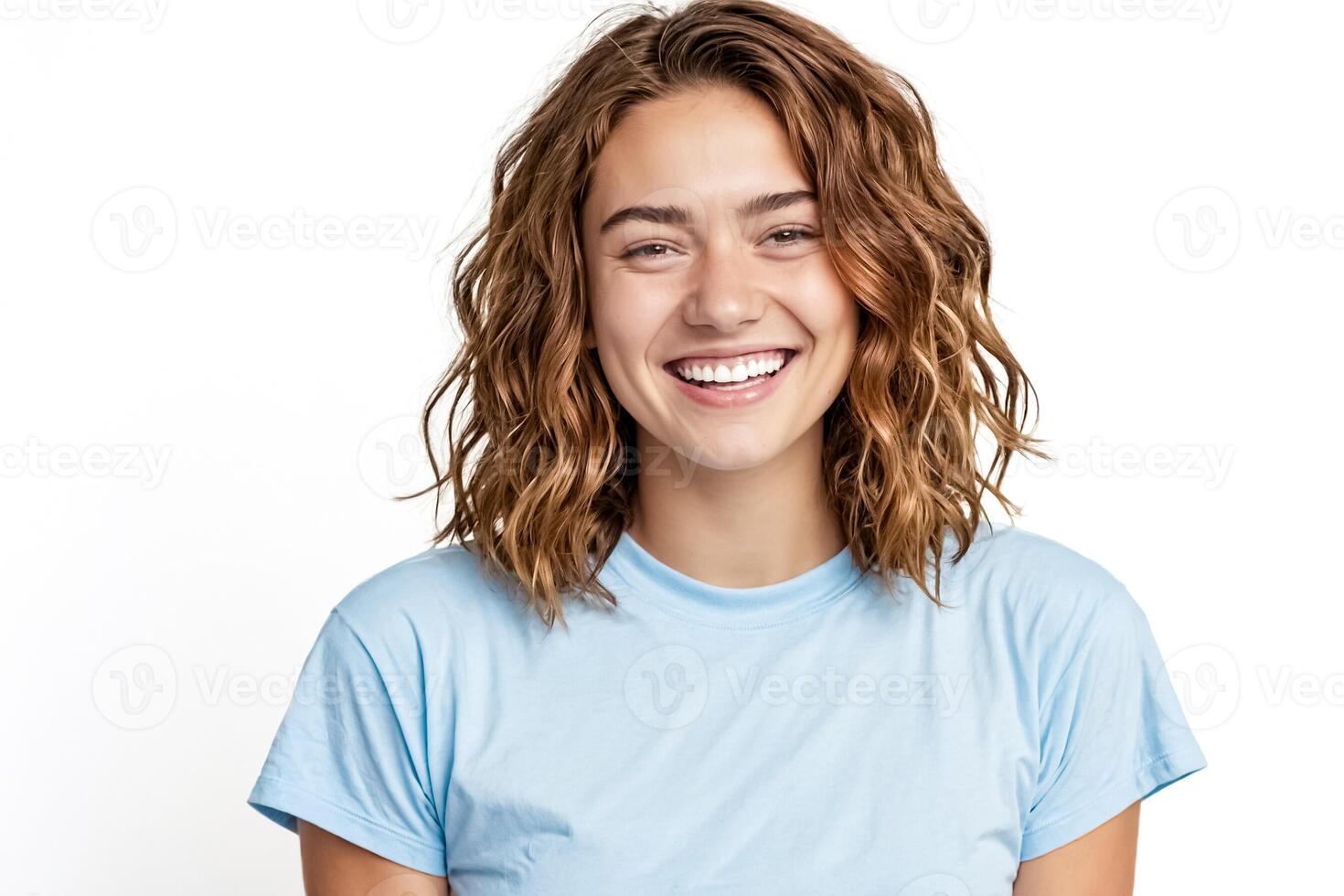 Happy young woman with curly hair and bright smile photo
