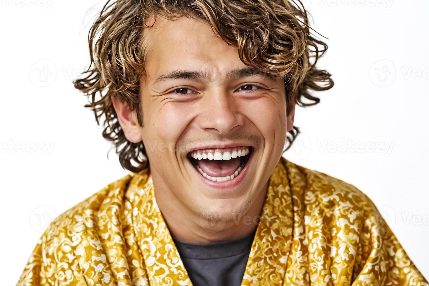 Happy Young Man with Curly Hair Laughing photo