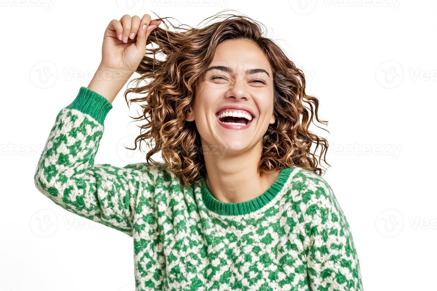 Woman in green sweater laughing with joy photo