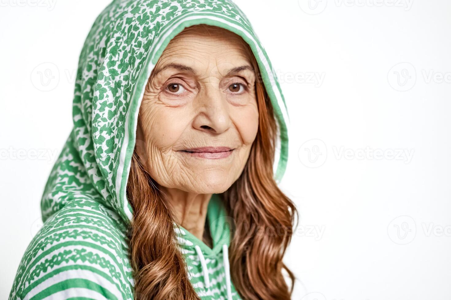 Portrait of a Senior Woman in a Green Hooded Sweater photo