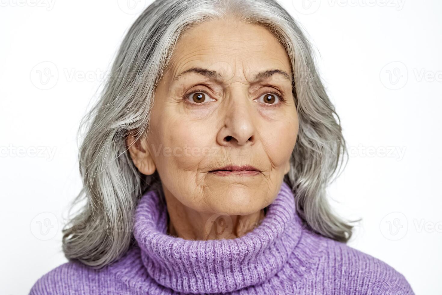 Portrait of a Senior Woman with Gray Hair in a Purple Sweater photo