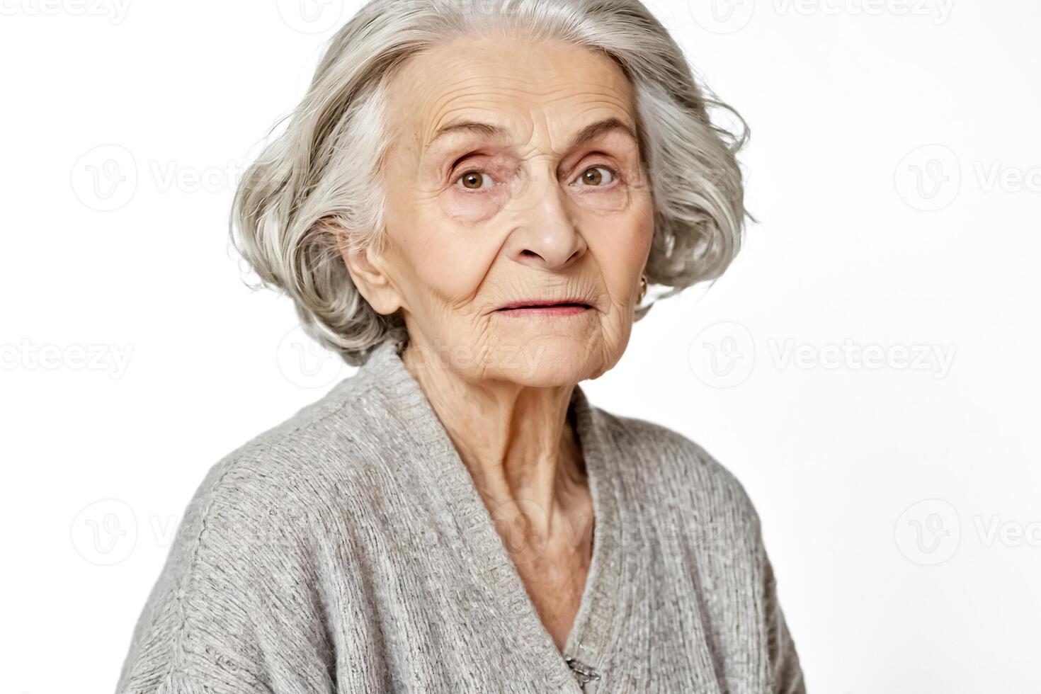 Portrait of a senior woman with grey hair and wrinkles photo
