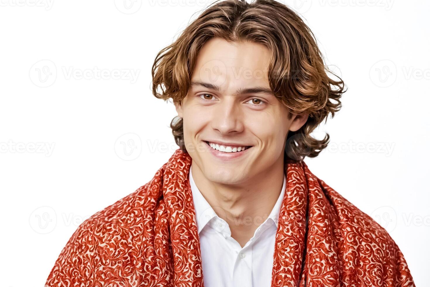 Portrait of a smiling young man wearing a red patterned scarf photo