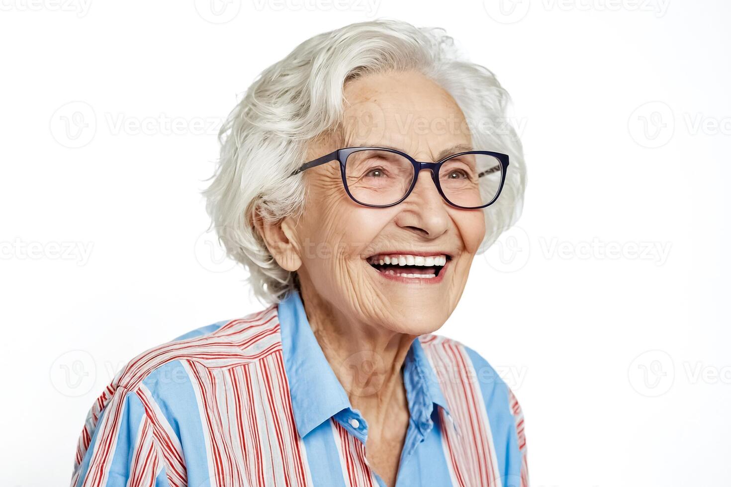 Senior woman with white hair and glasses smiling photo