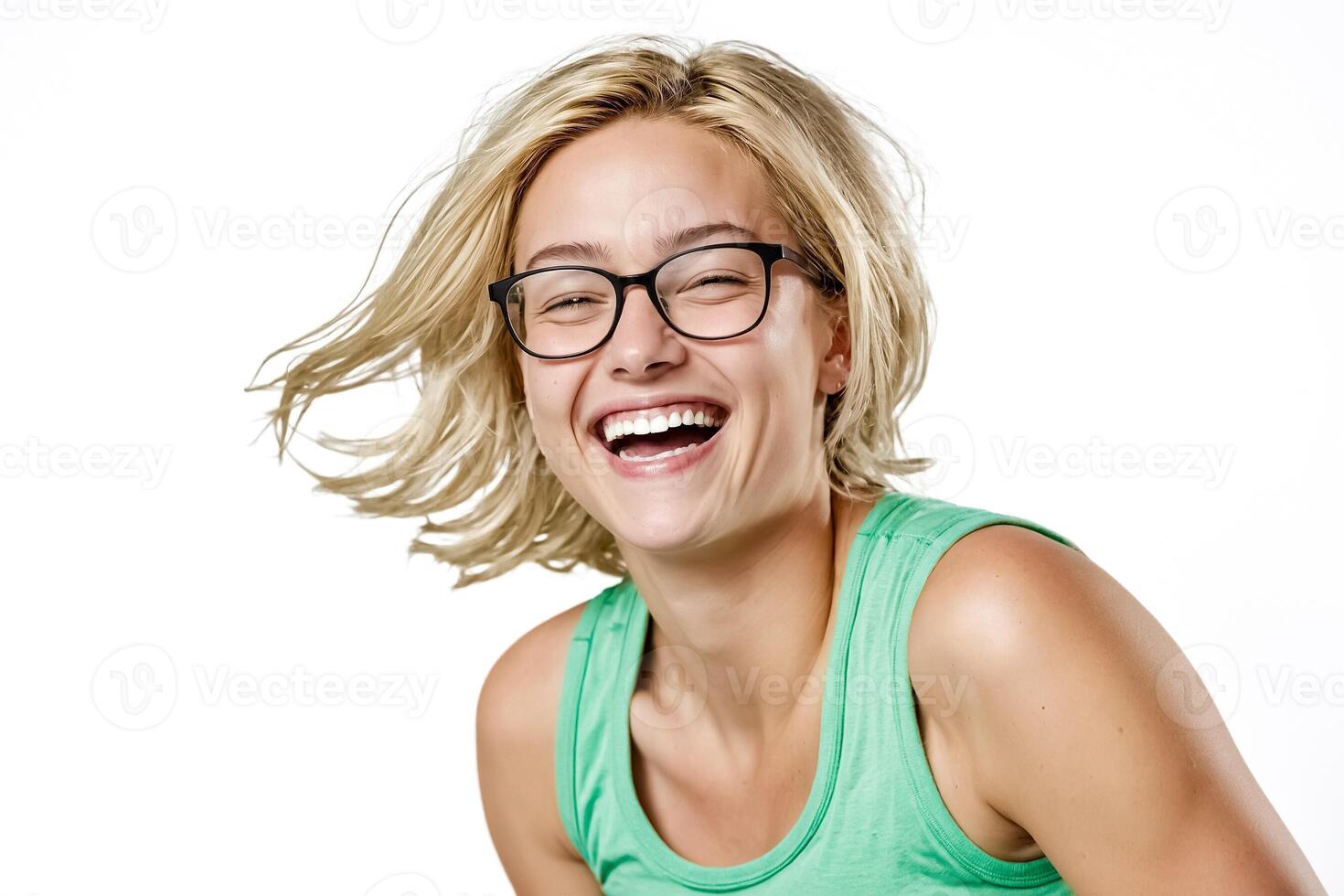 Happy woman with glasses laughs photo
