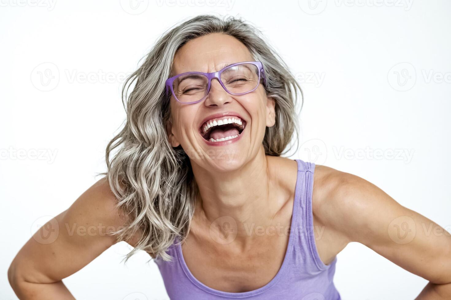 Portrait of a happy mature woman laughing photo