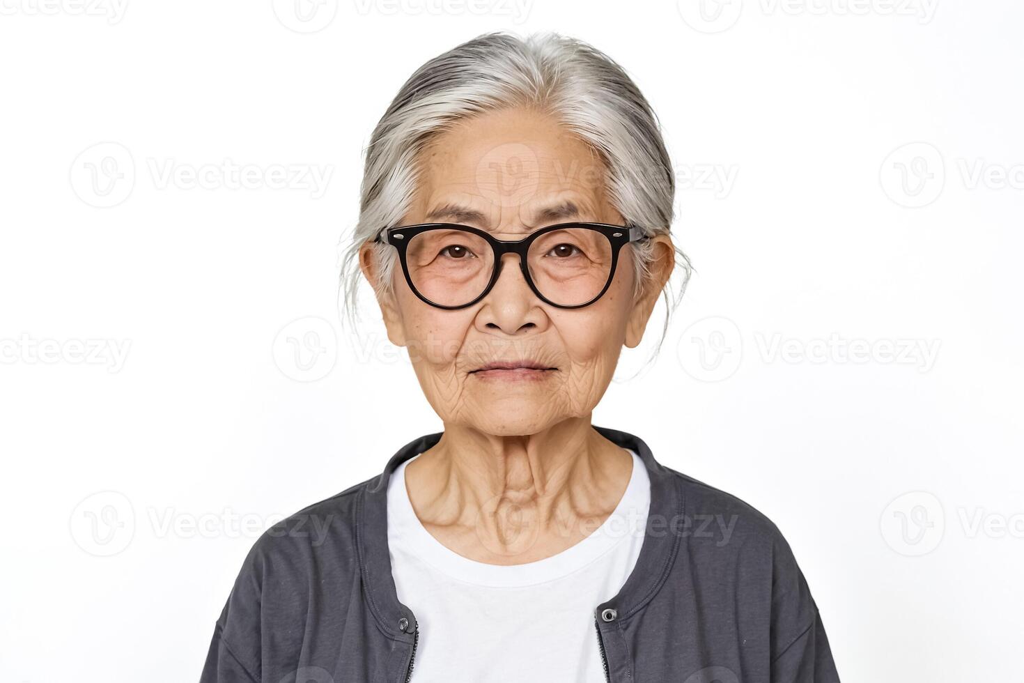 Portrait of an Elderly Woman with Grey Hair and Glasses photo