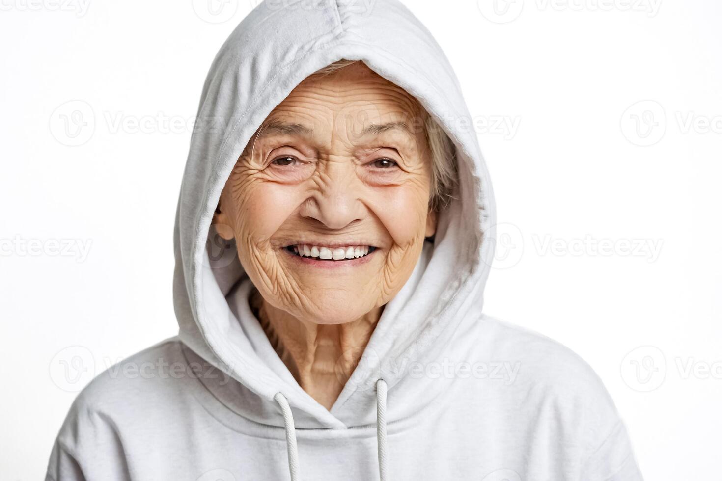 Portrait of a Smiling Senior Woman in a White Hoodie photo