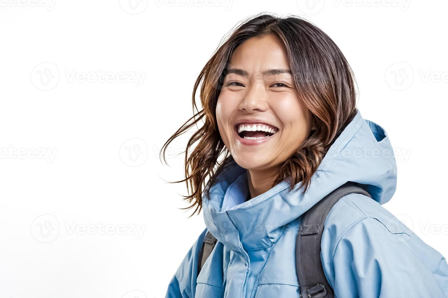 Portrait of a young woman smiling in a blue jacket photo