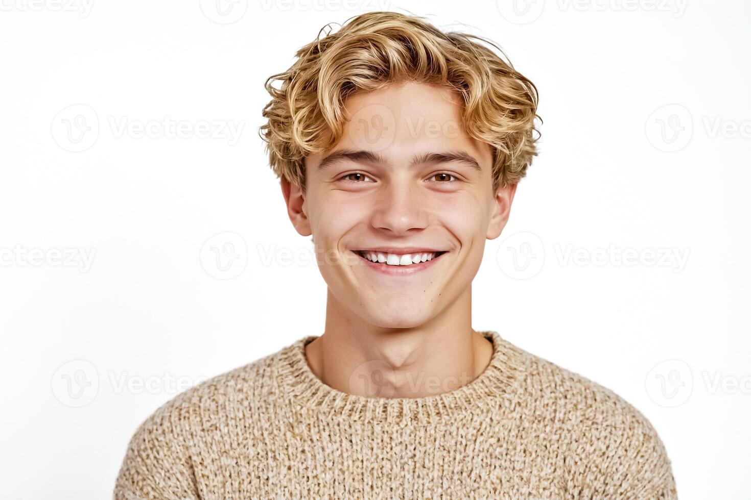 Portrait of a smiling young man with blond hair photo