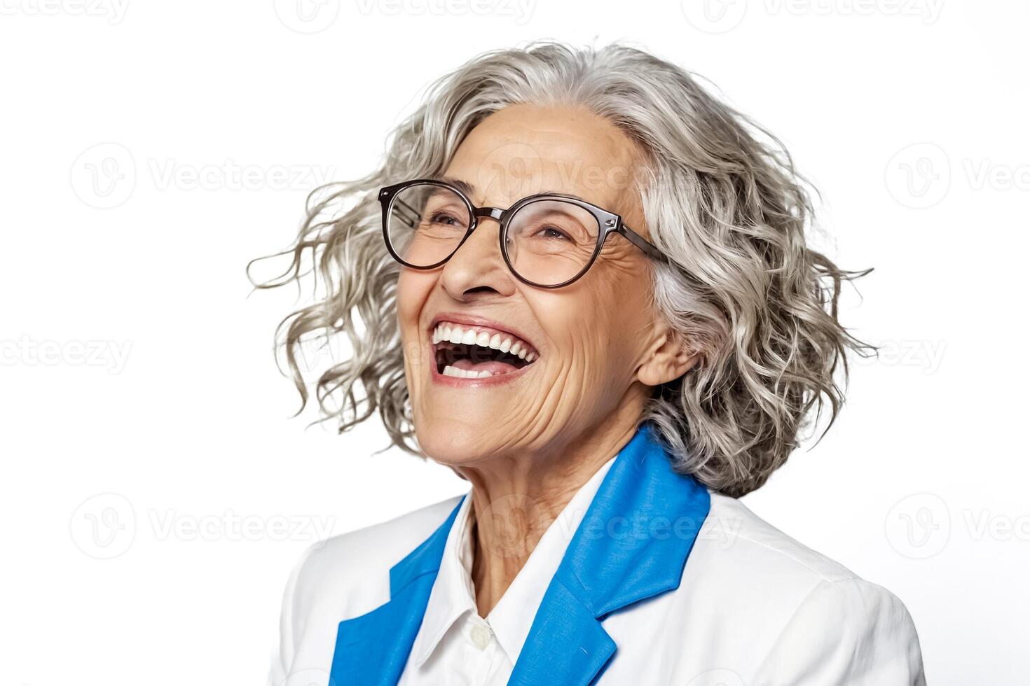 Portrait of a smiling senior woman with gray hair and glasses photo