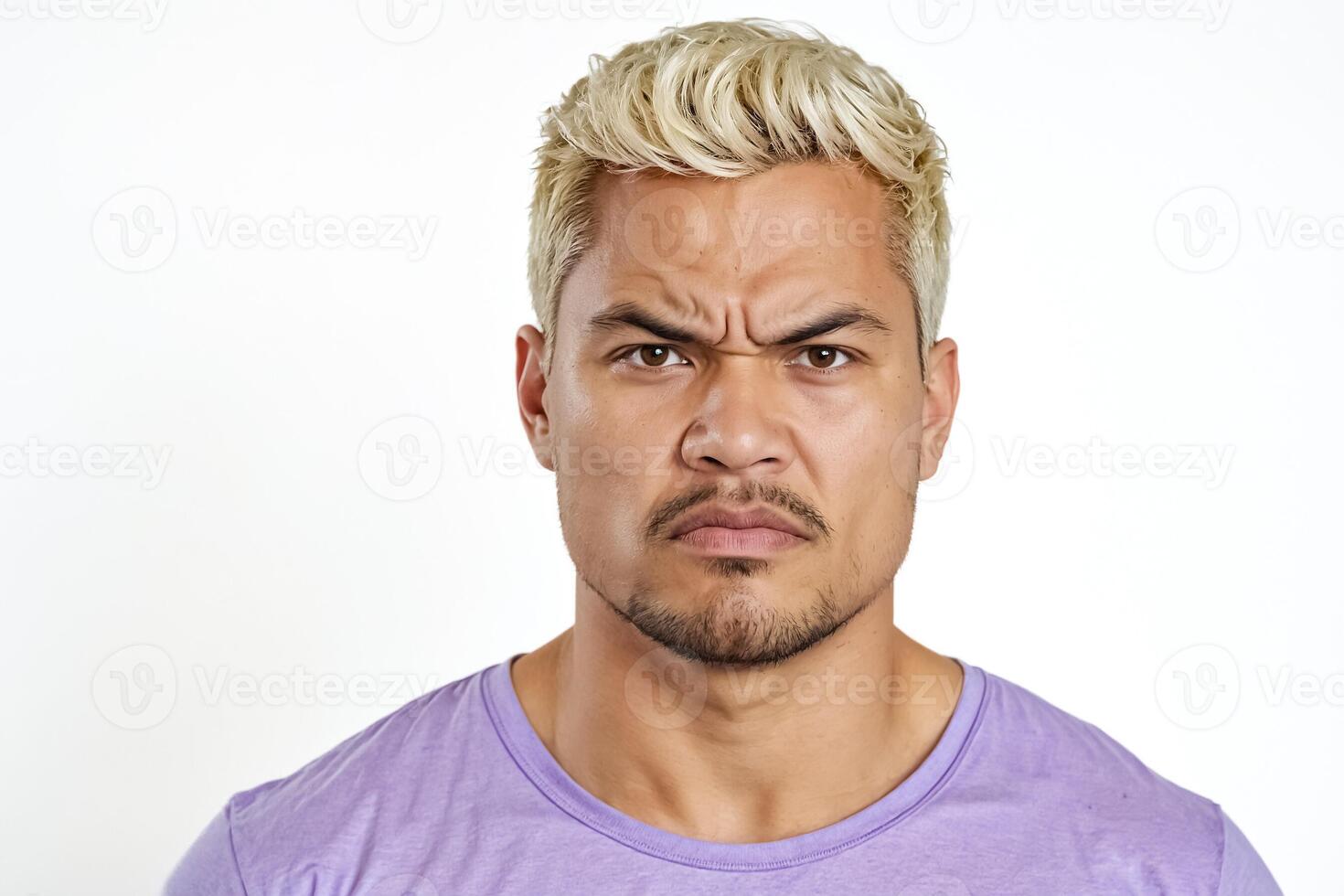 Young man with a skeptical expression photo