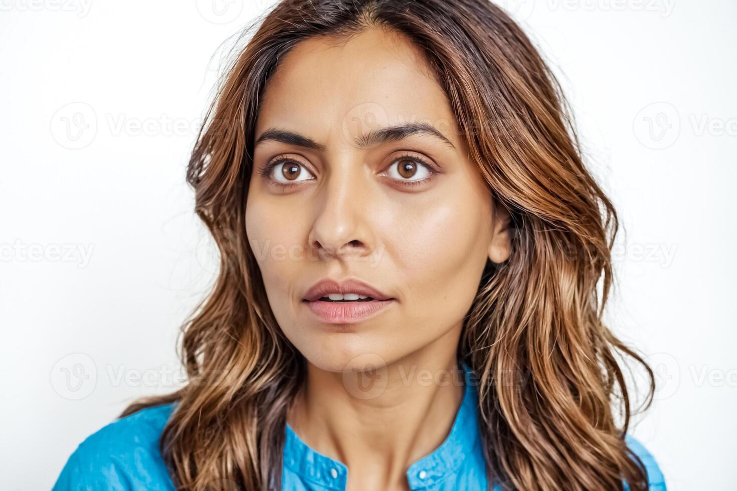 Close-up portrait of a young woman looking to the side photo