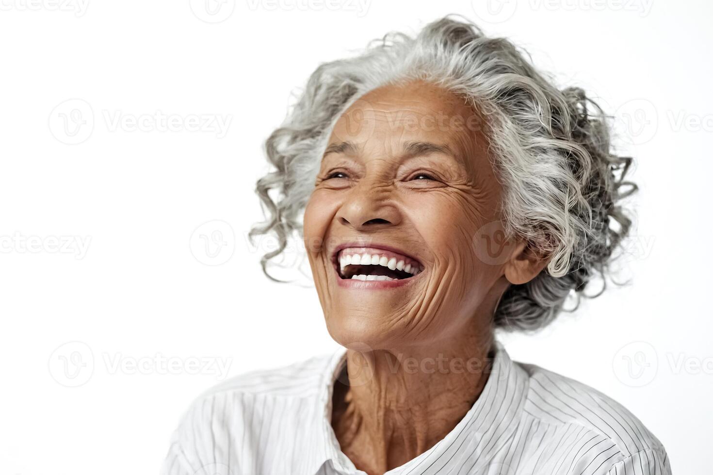 Close-up of a Senior Woman Laughing with Joy photo