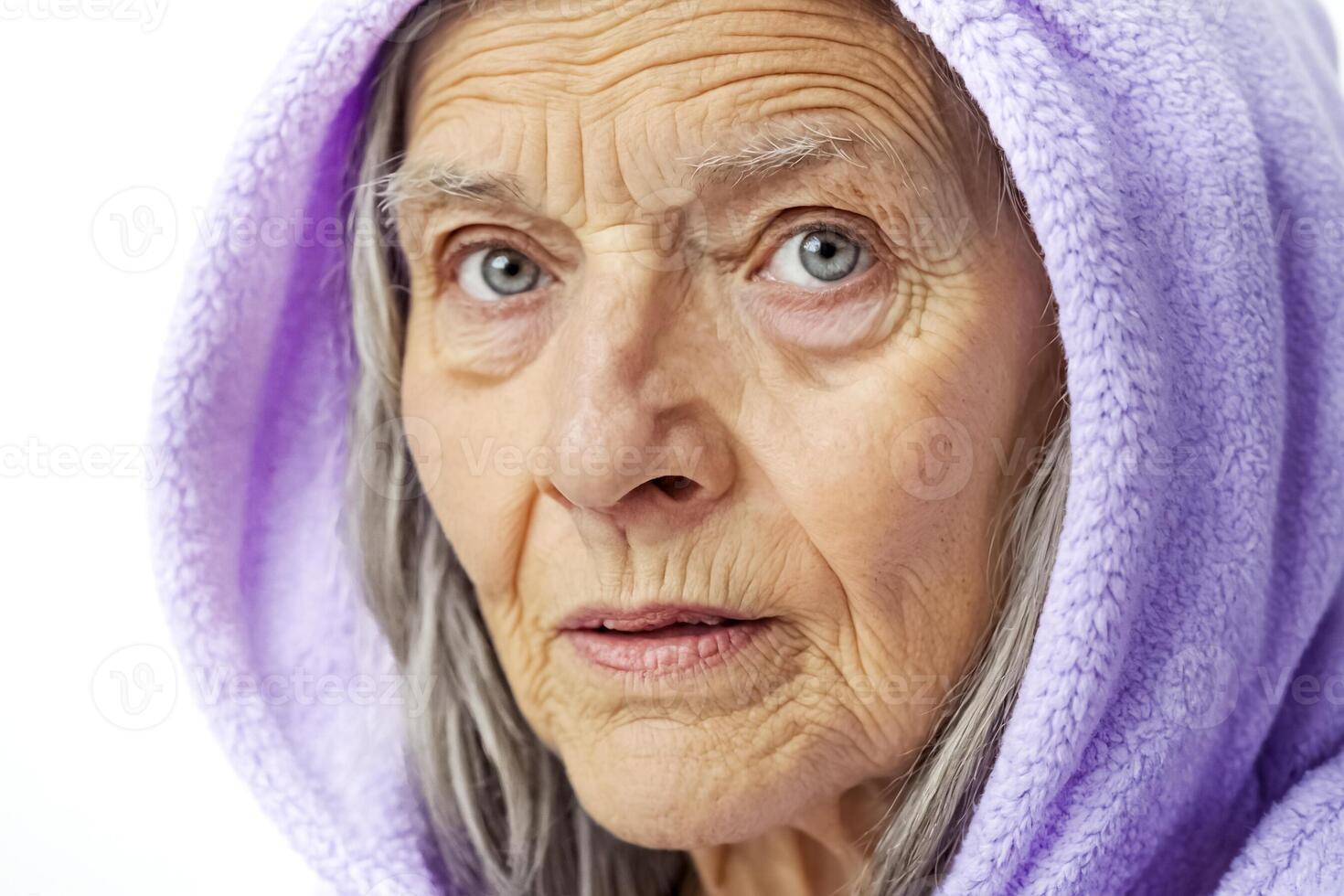 Closeup Portrait of Senior Woman Wearing a Purple Hoodie photo