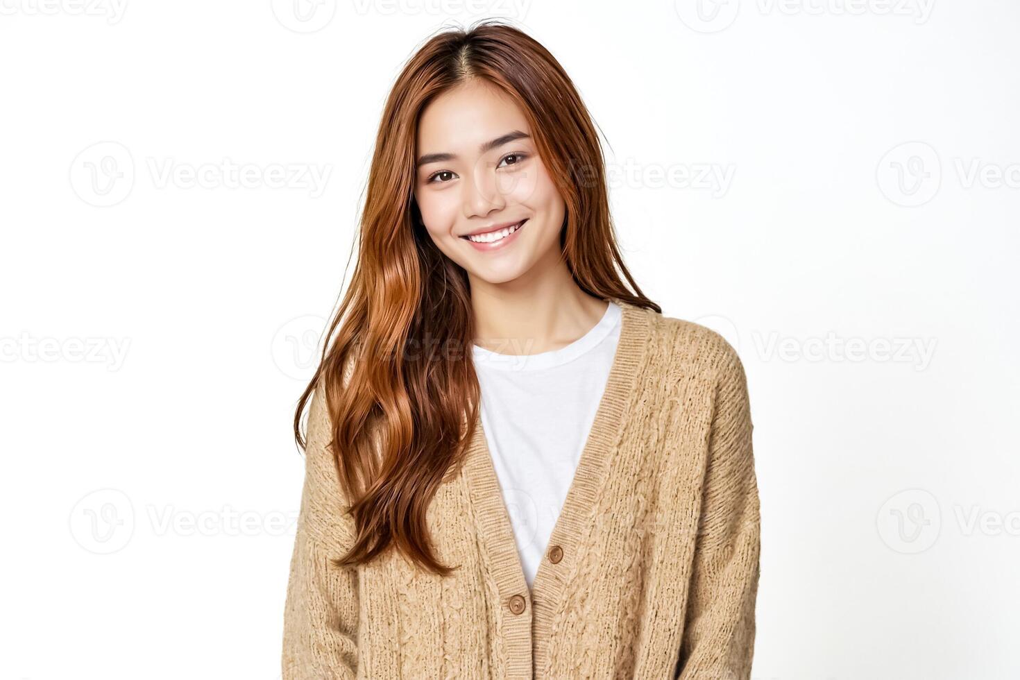 Happy young woman smiling and looking at the camera photo