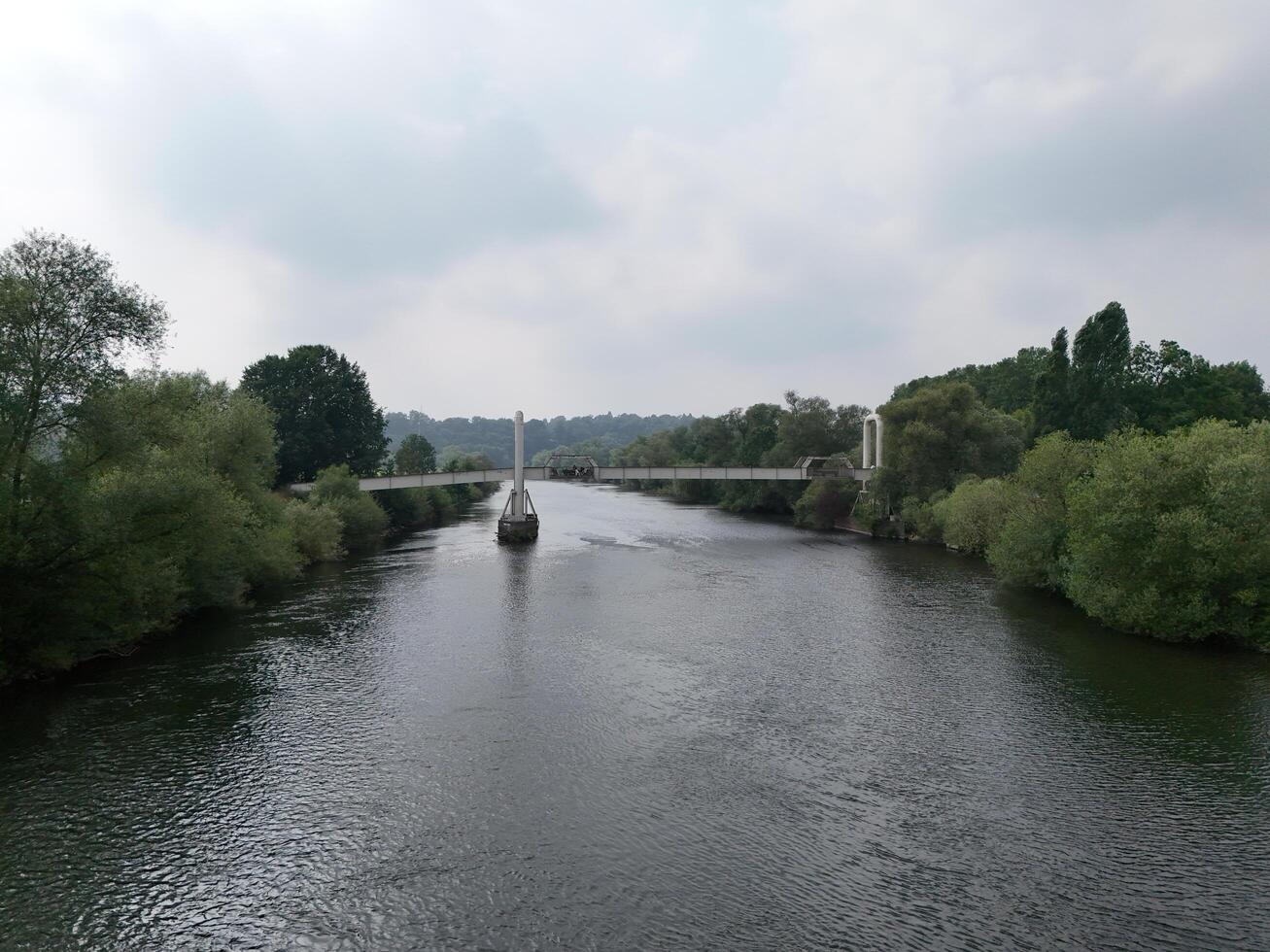 a river with a bridge over it photo
