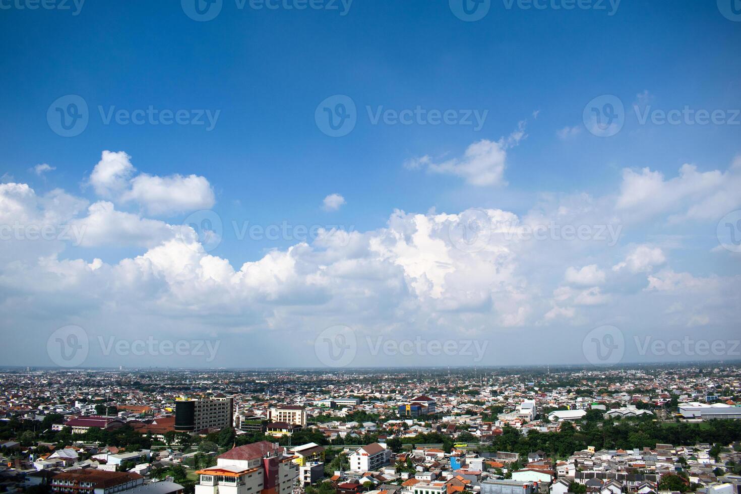 High angle aerial Settlement semarang Indonesia with cloudy blue sky background photo