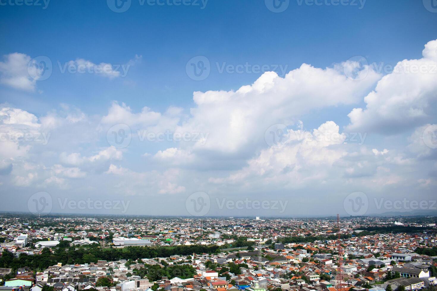 High angle aerial Settlement semarang Indonesia with cloudy blue sky background photo