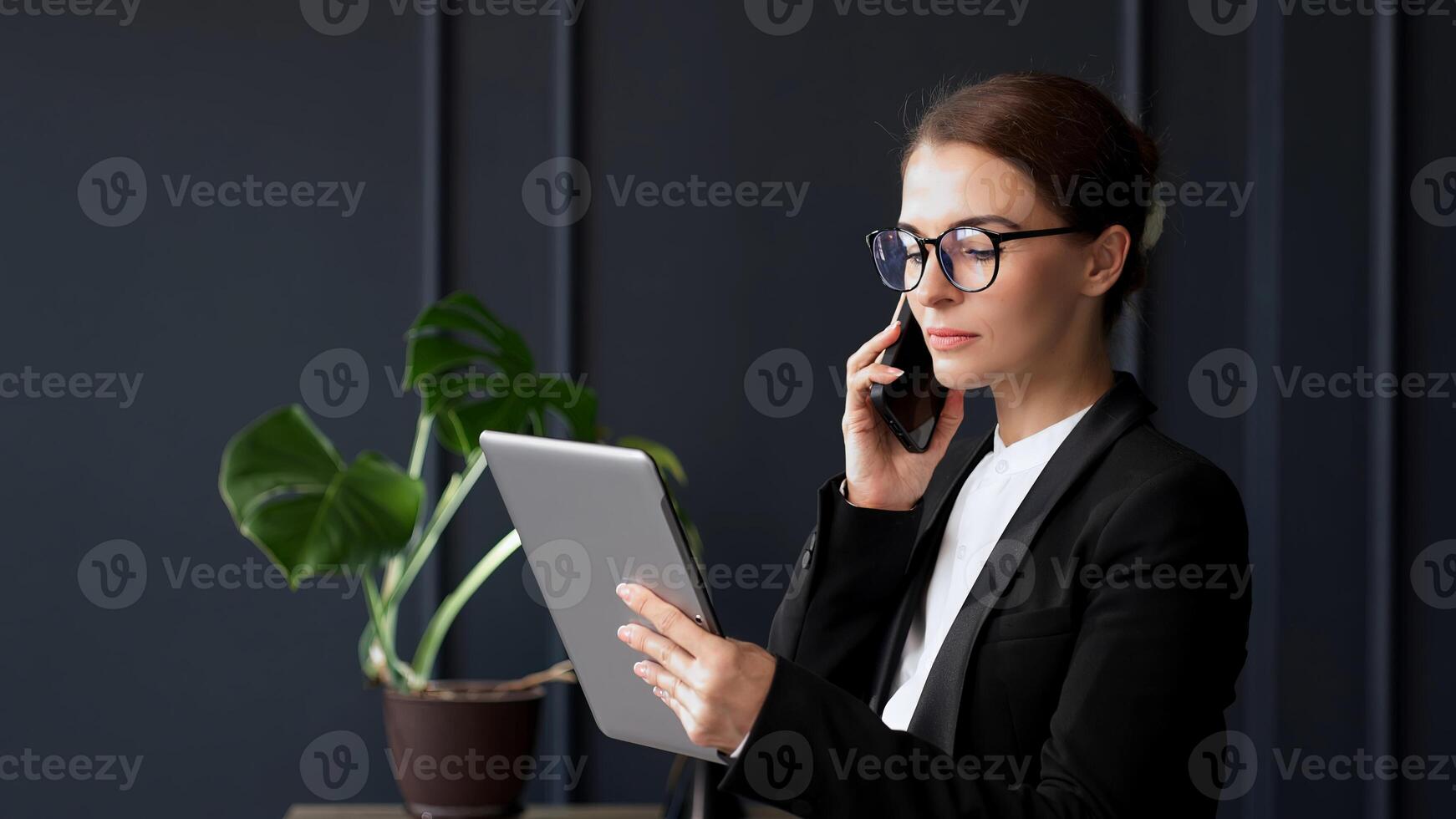 Middle-aged Business woman working in office with documents and laptop people. Consulting and business planning. Creative startup, digital tech for research, website and discussion. photo