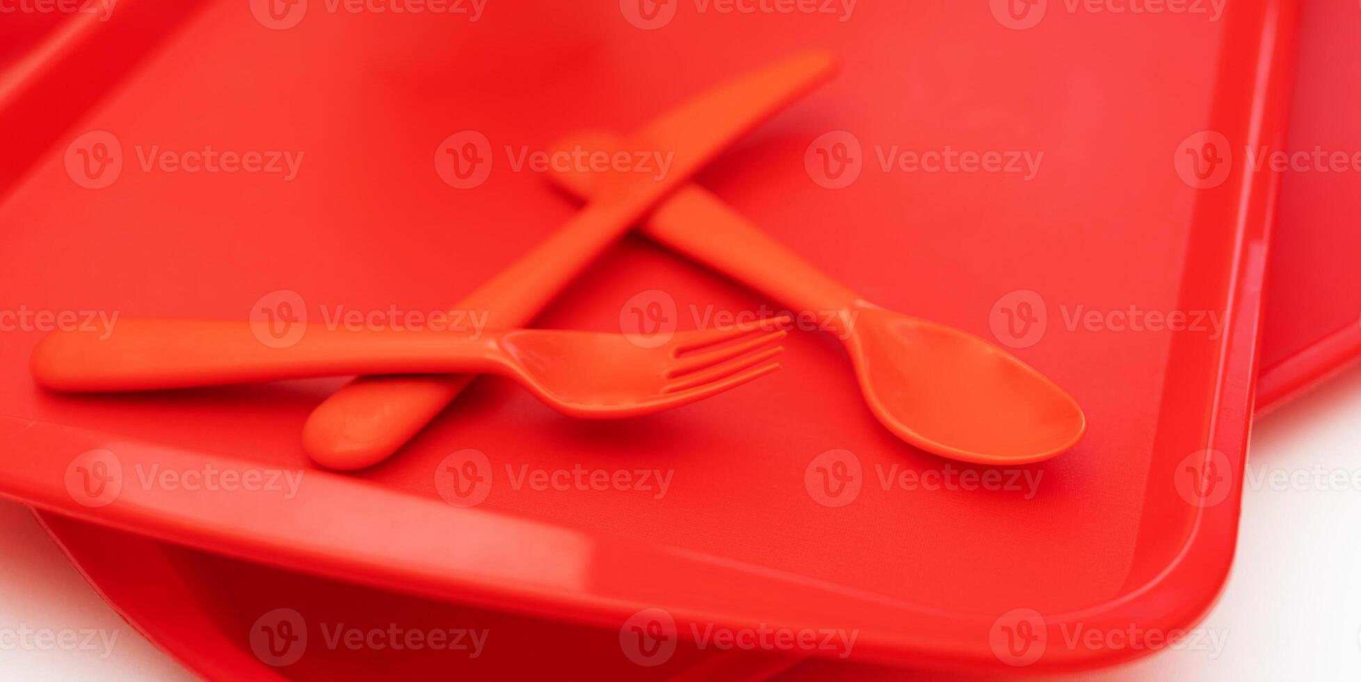 Red plastic food tray in a fast food restaurant. photo