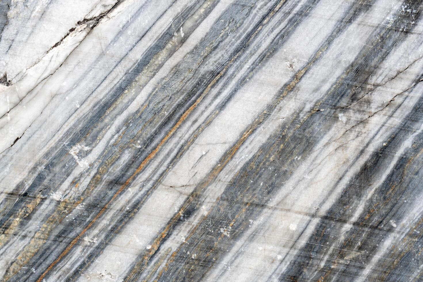 Gray surface of marble stone with striped streaks. photo
