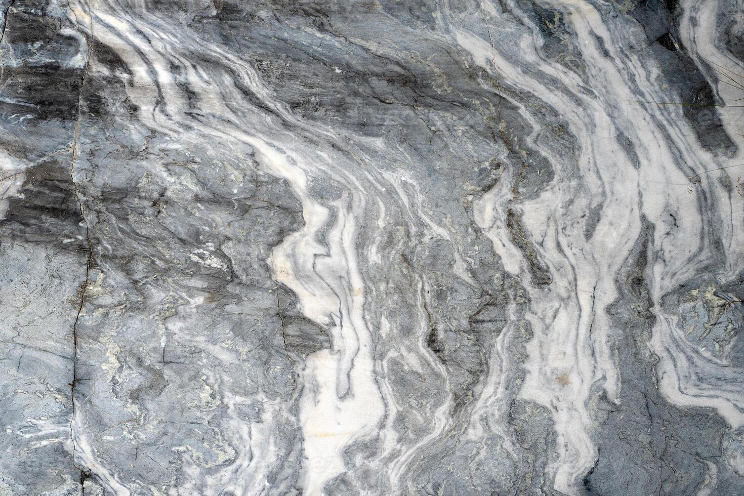 Gray surface of marble stone with striped streaks. photo