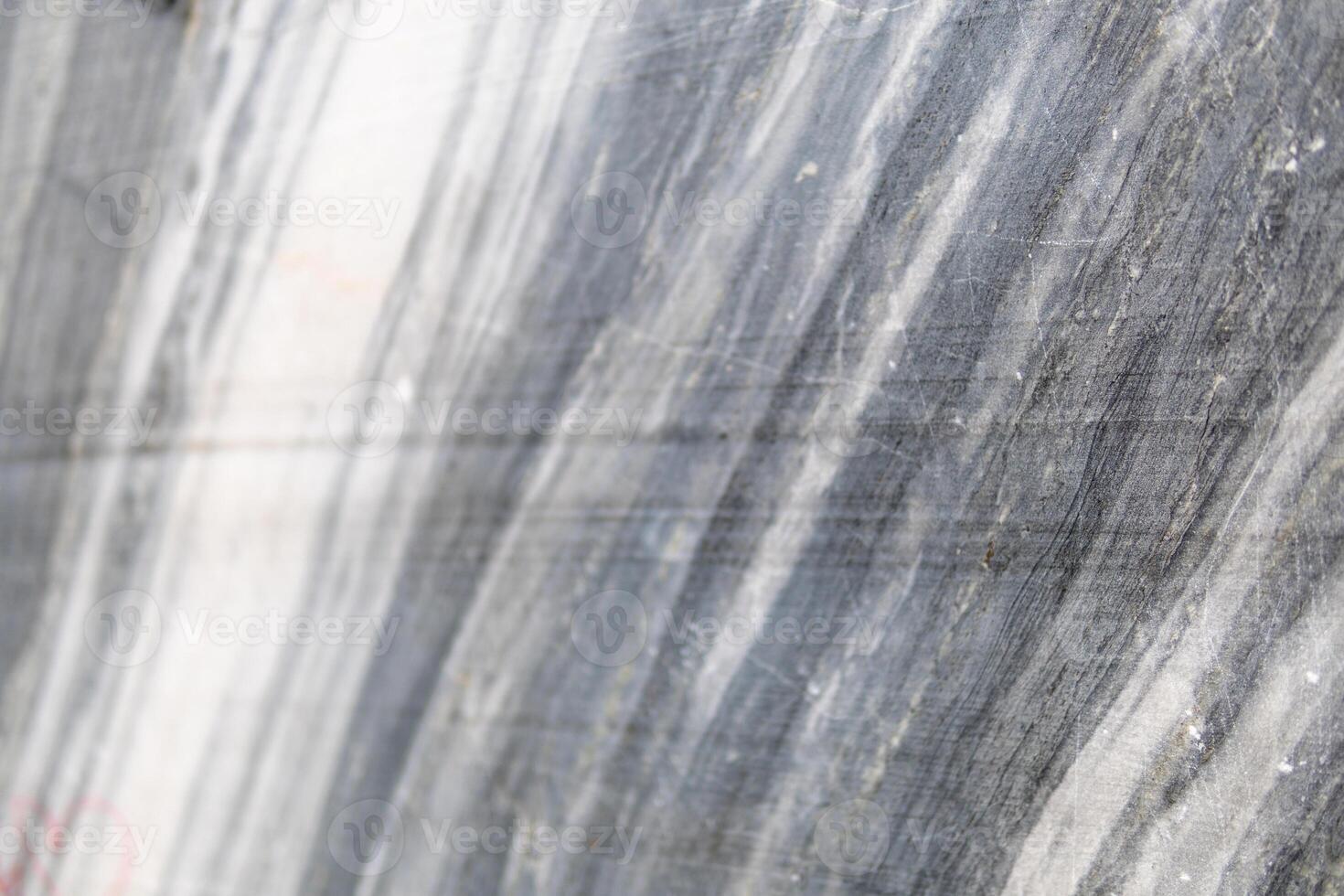 Gray surface of marble stone with striped streaks. photo