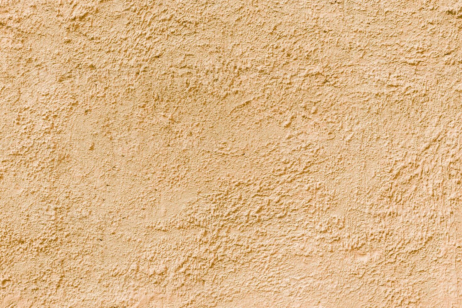 Abstract rough beige texture. Architectural abstract background. Plastered building wall. photo