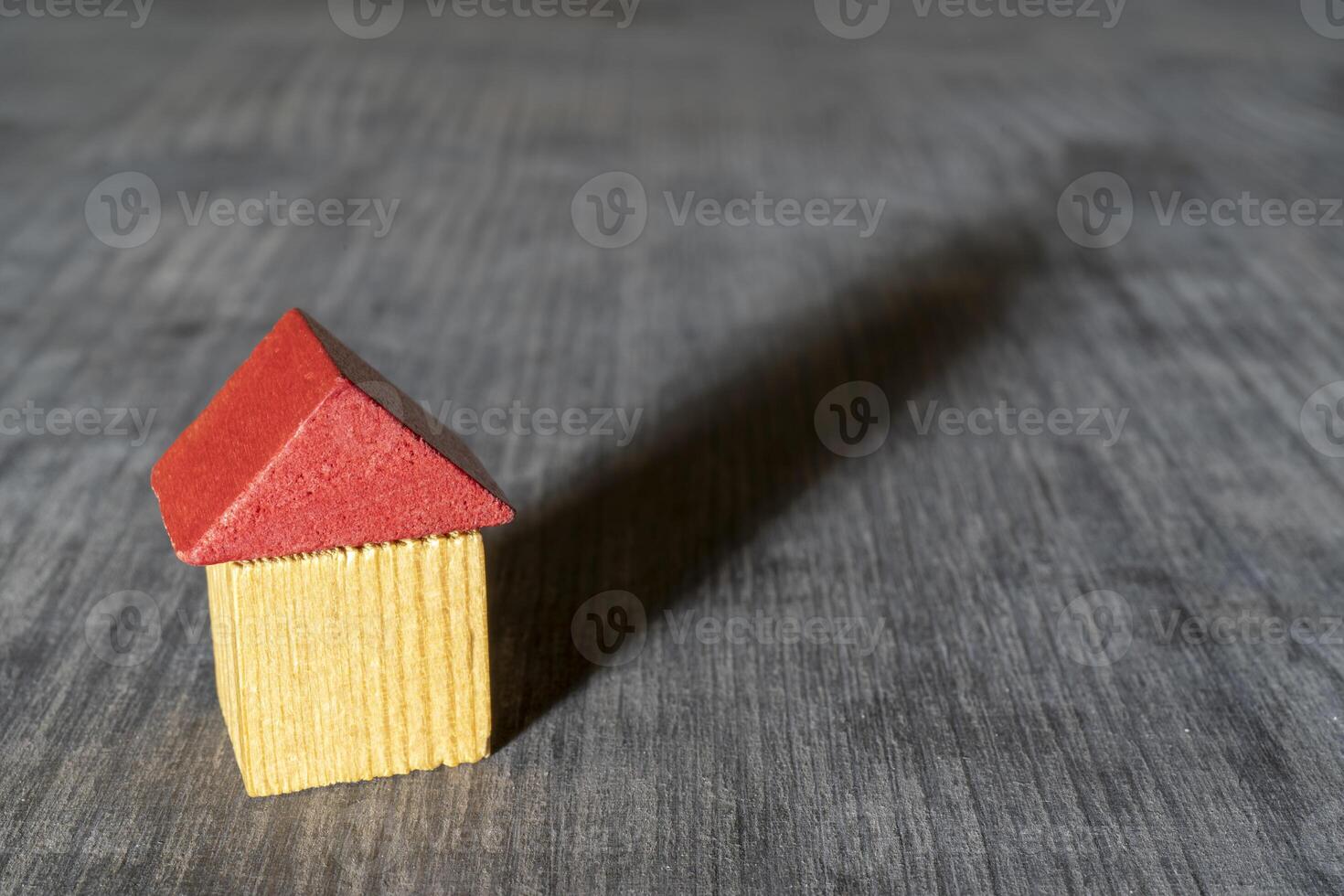 Red roof wooden toy house. photo