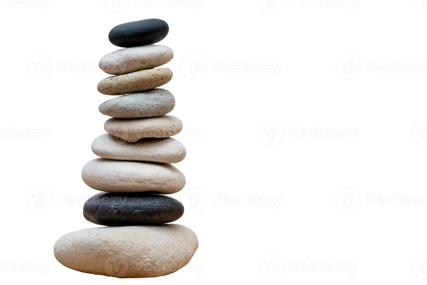 Stack of pebbles in an unstable state. A pyramid made of flat stones. photo
