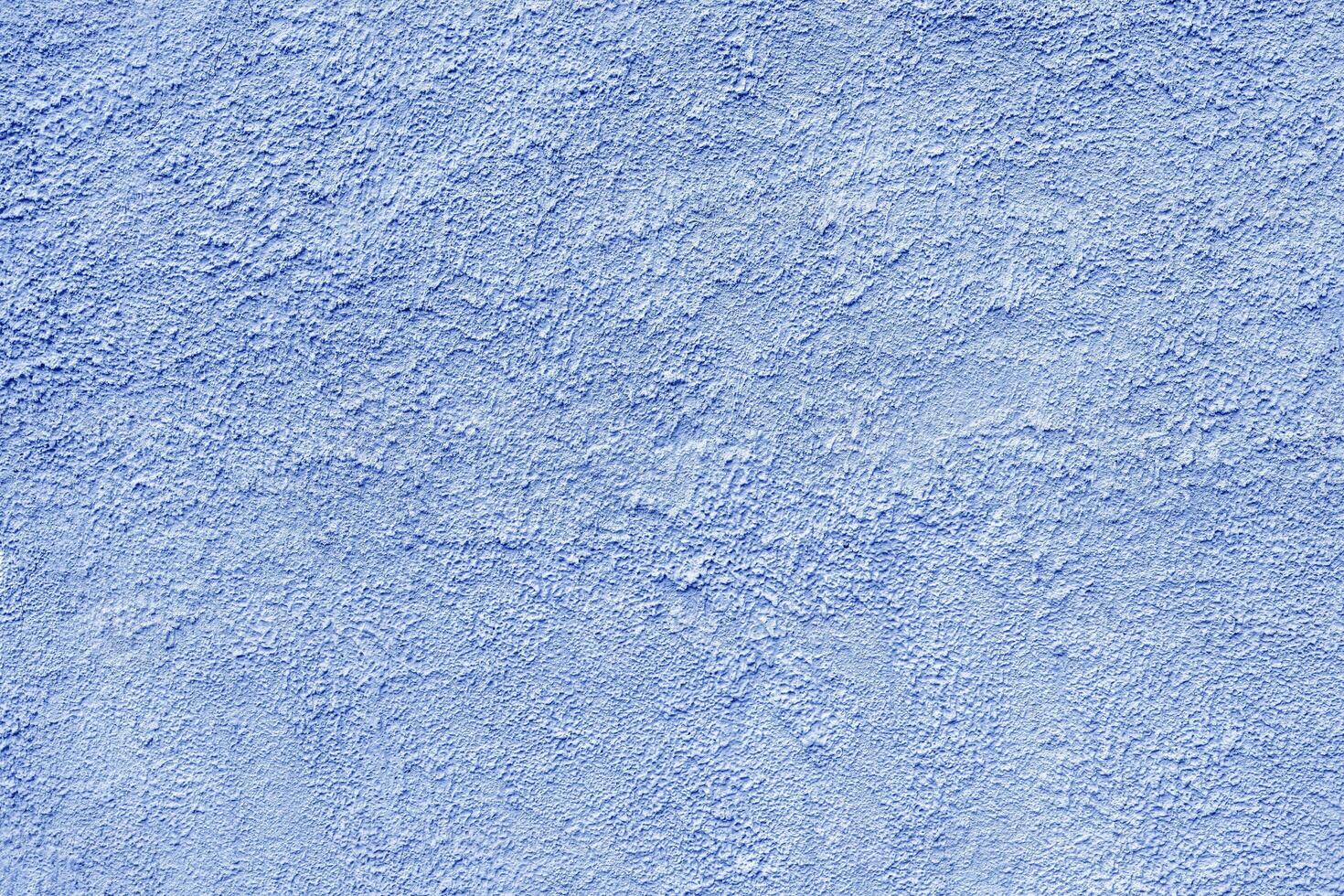 Abstract rough blue texture. Architectural abstract background. Plastered building wall. photo