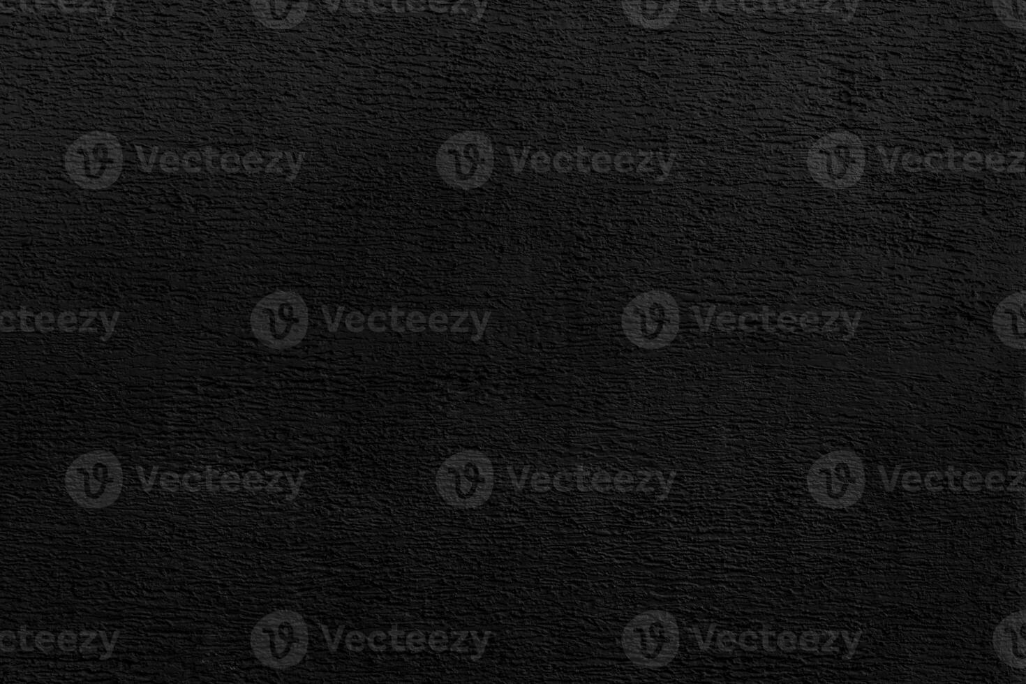 Texture of black plaster. Interior of a modern loft. Abstract rough background. The facade of an old house. photo