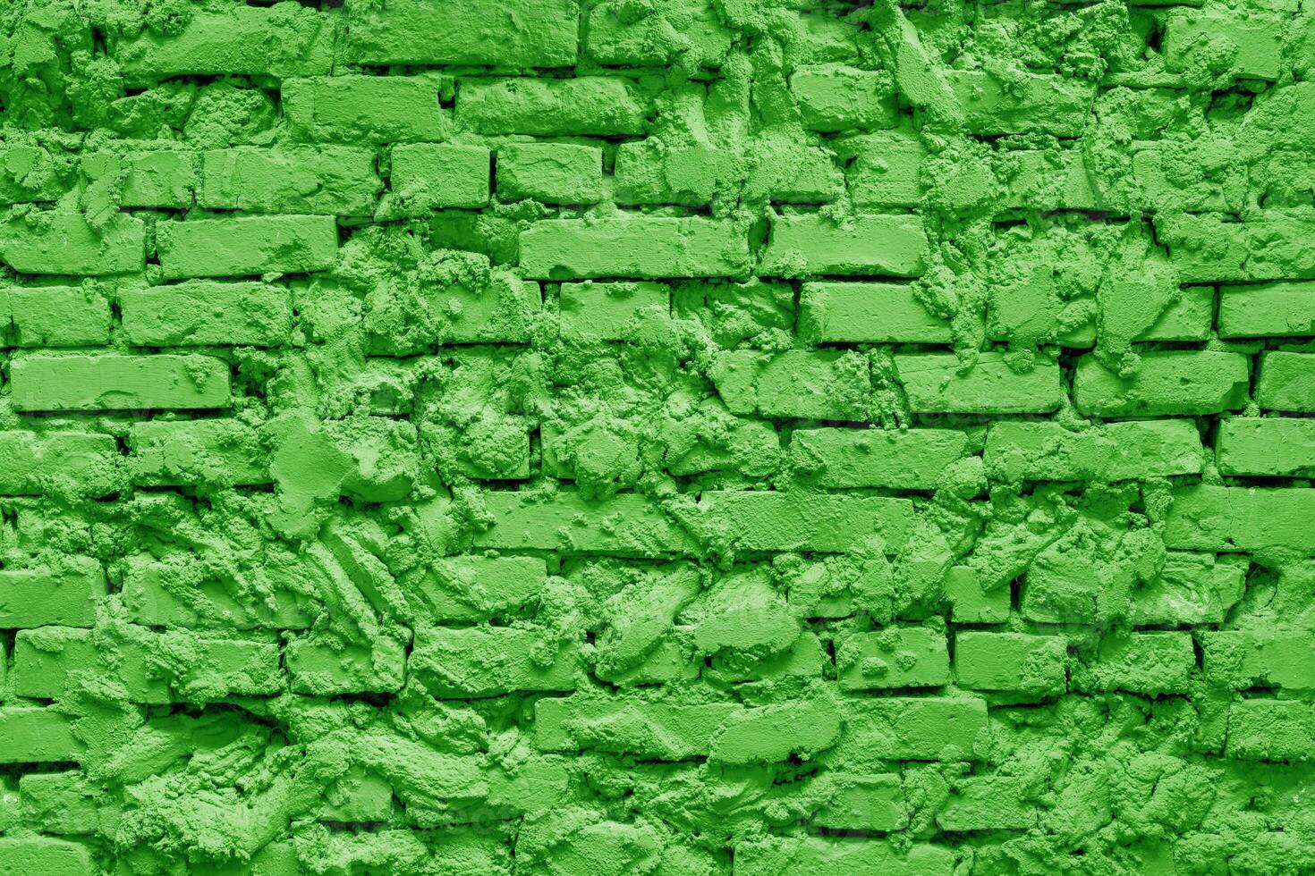 Green brick building wall. Interior of a modern loft. Background for design and interview recording. photo