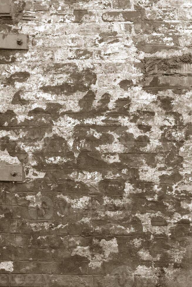 The background of the old beige brick wall for design interior and various scenes or as a background for interviews. photo