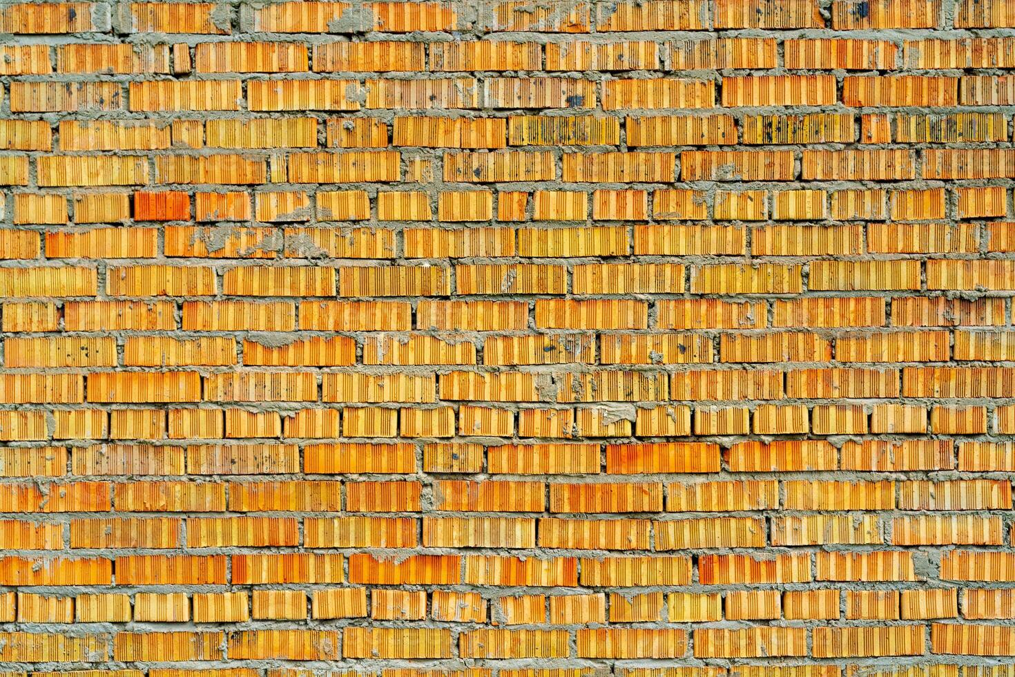 Yellow brick building wall. Interior of a modern loft. Background for design and interview recording. photo