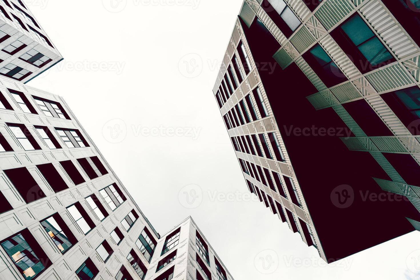 High-rise buildings of modern city. View from below. photo