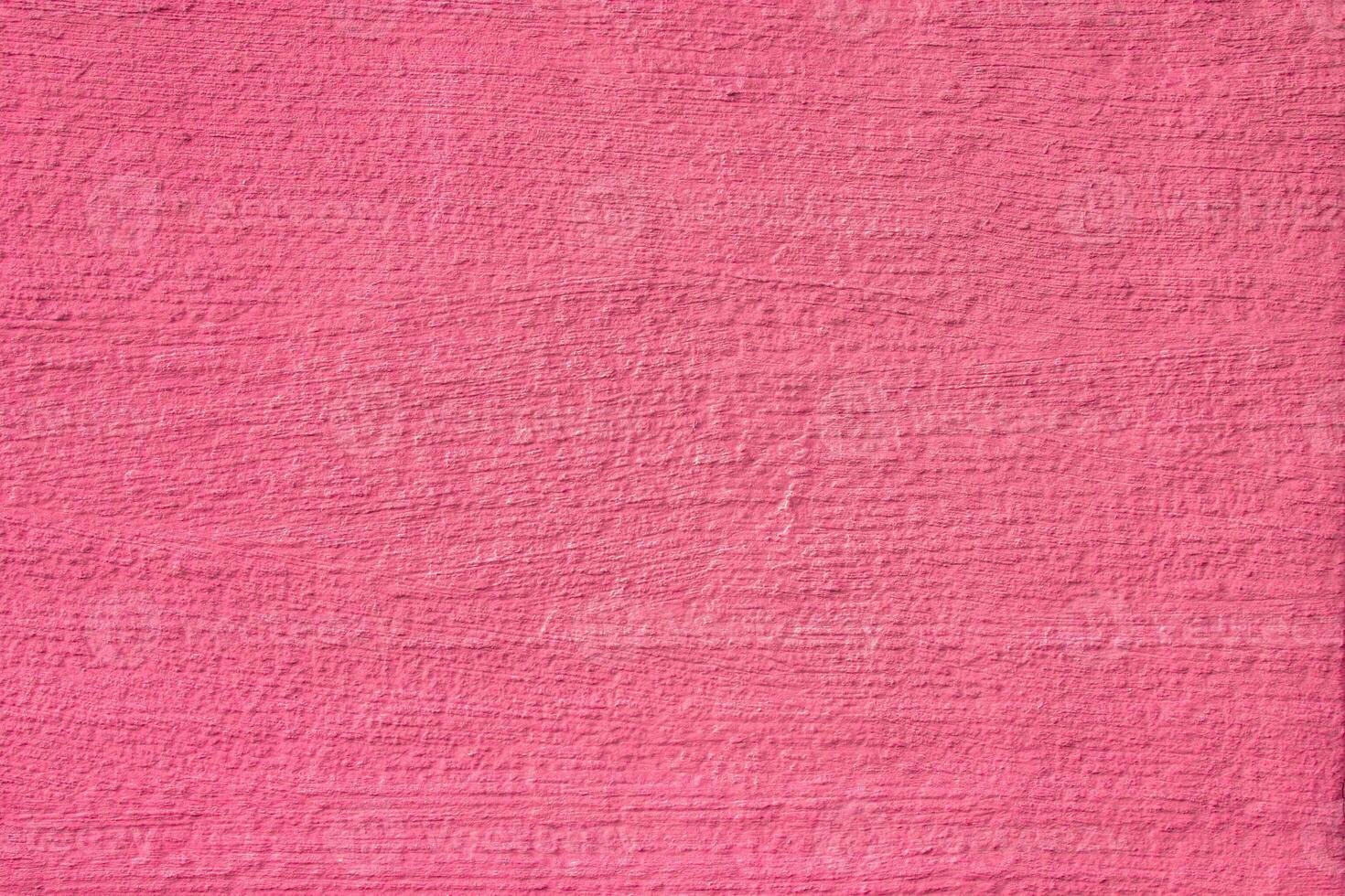 Abstract pink background. Pink color of rough surface. photo