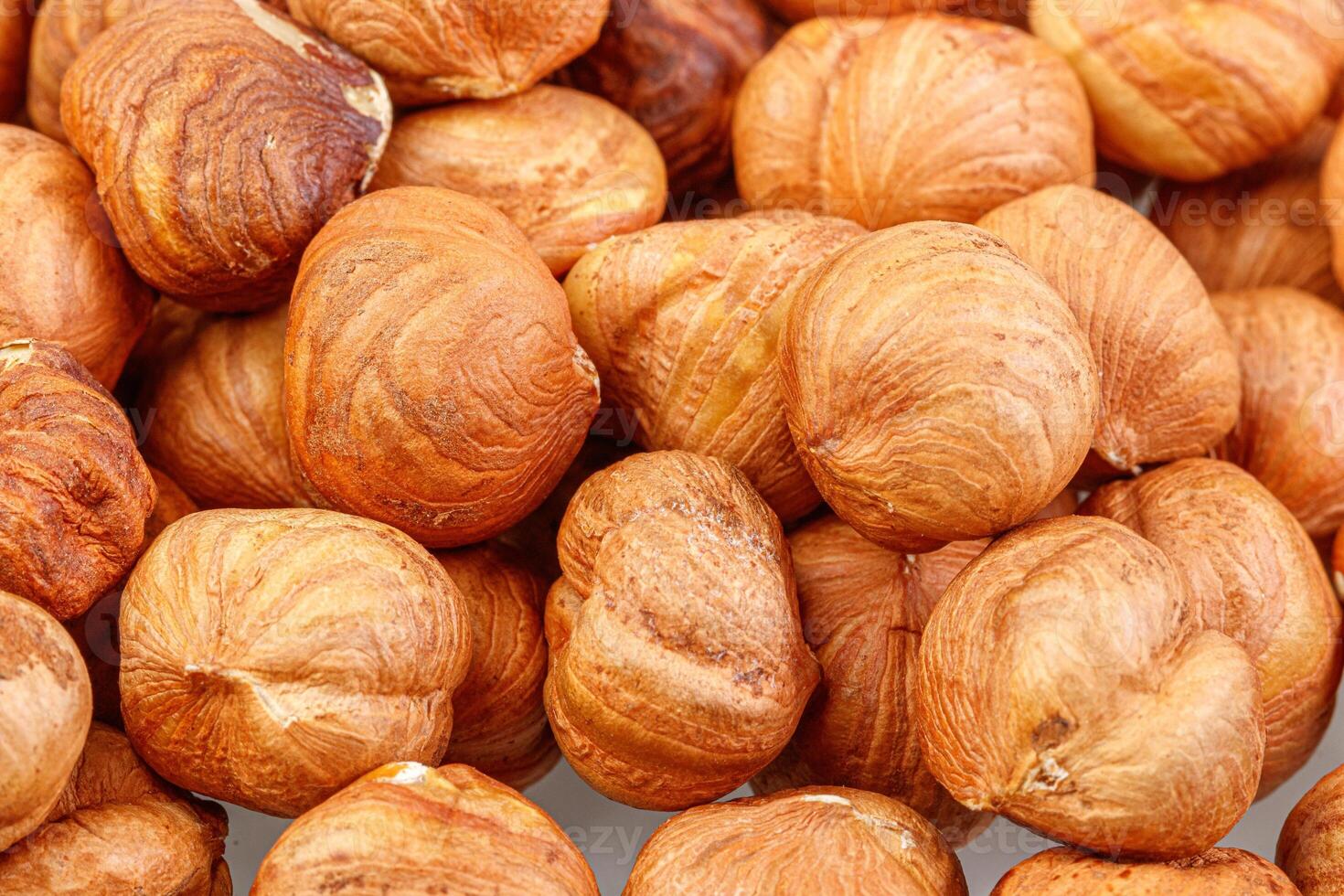 macro hazelnuts nuts on a white background photo