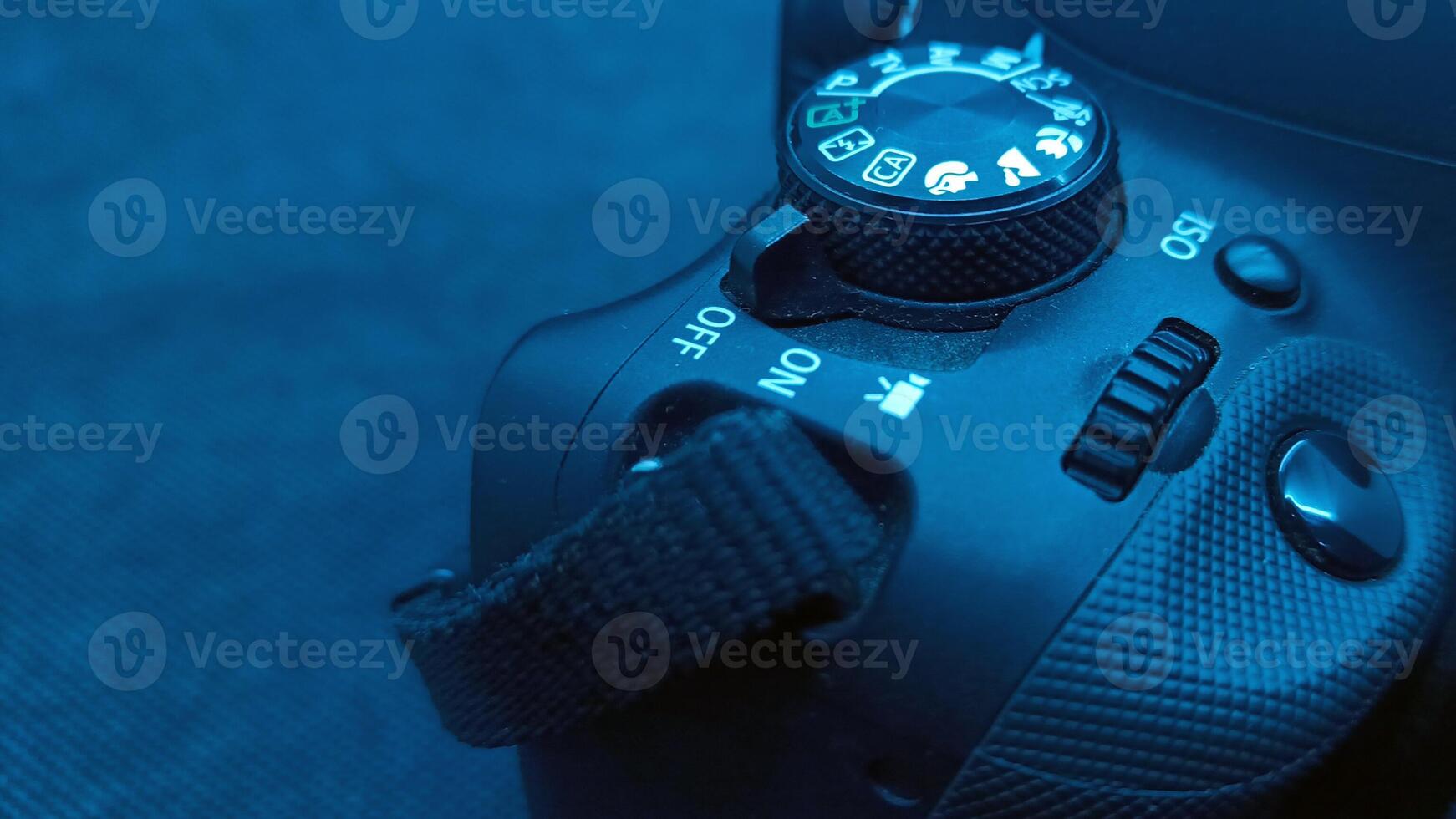 Close up view camera with blue effect photo