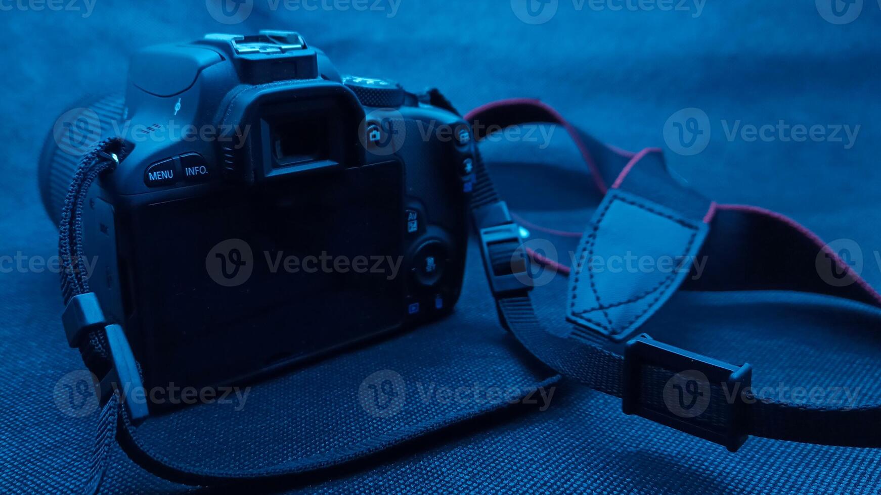 Close up view camera with blue effect photo