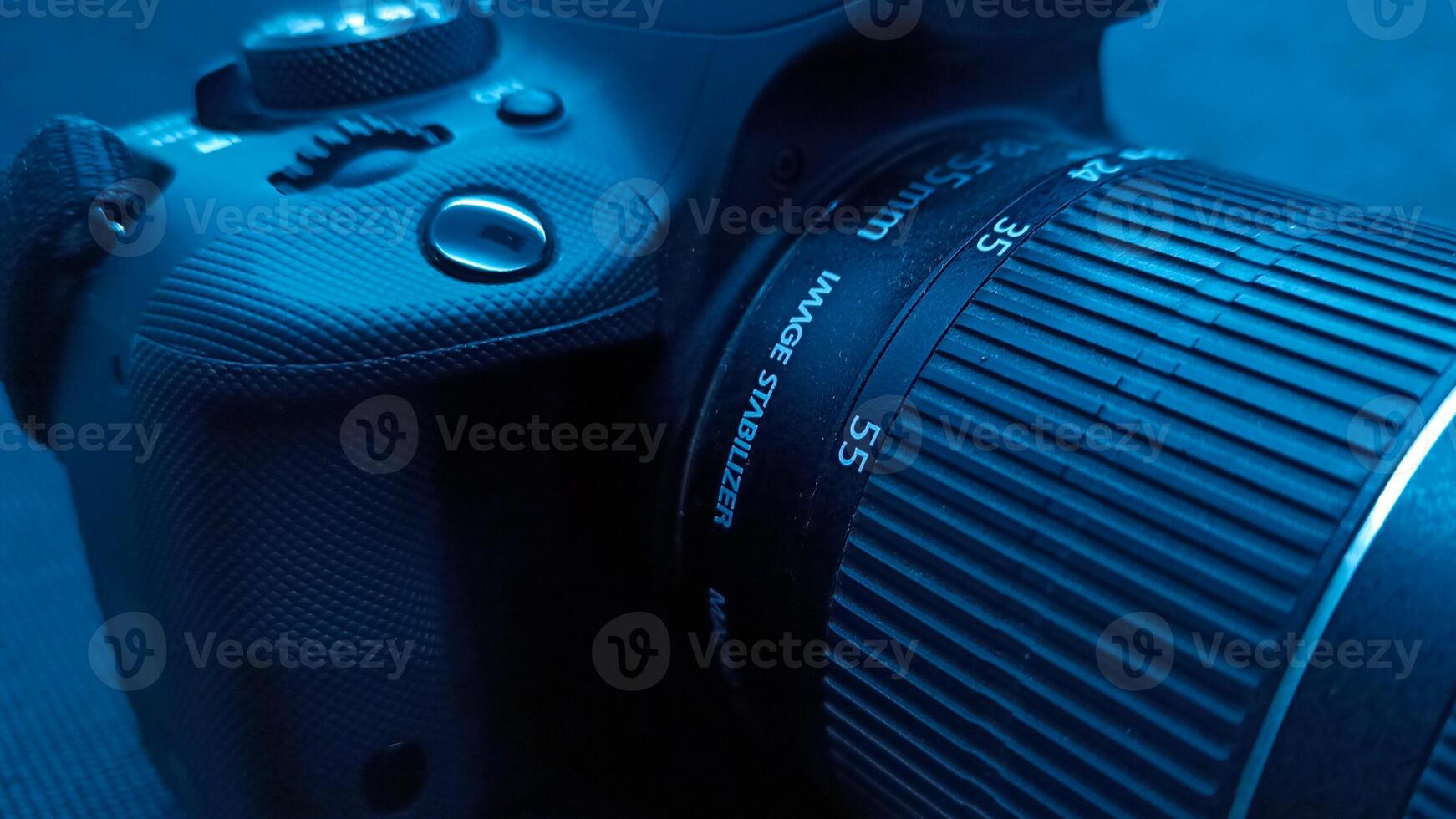 Close up view camera with blue effect photo