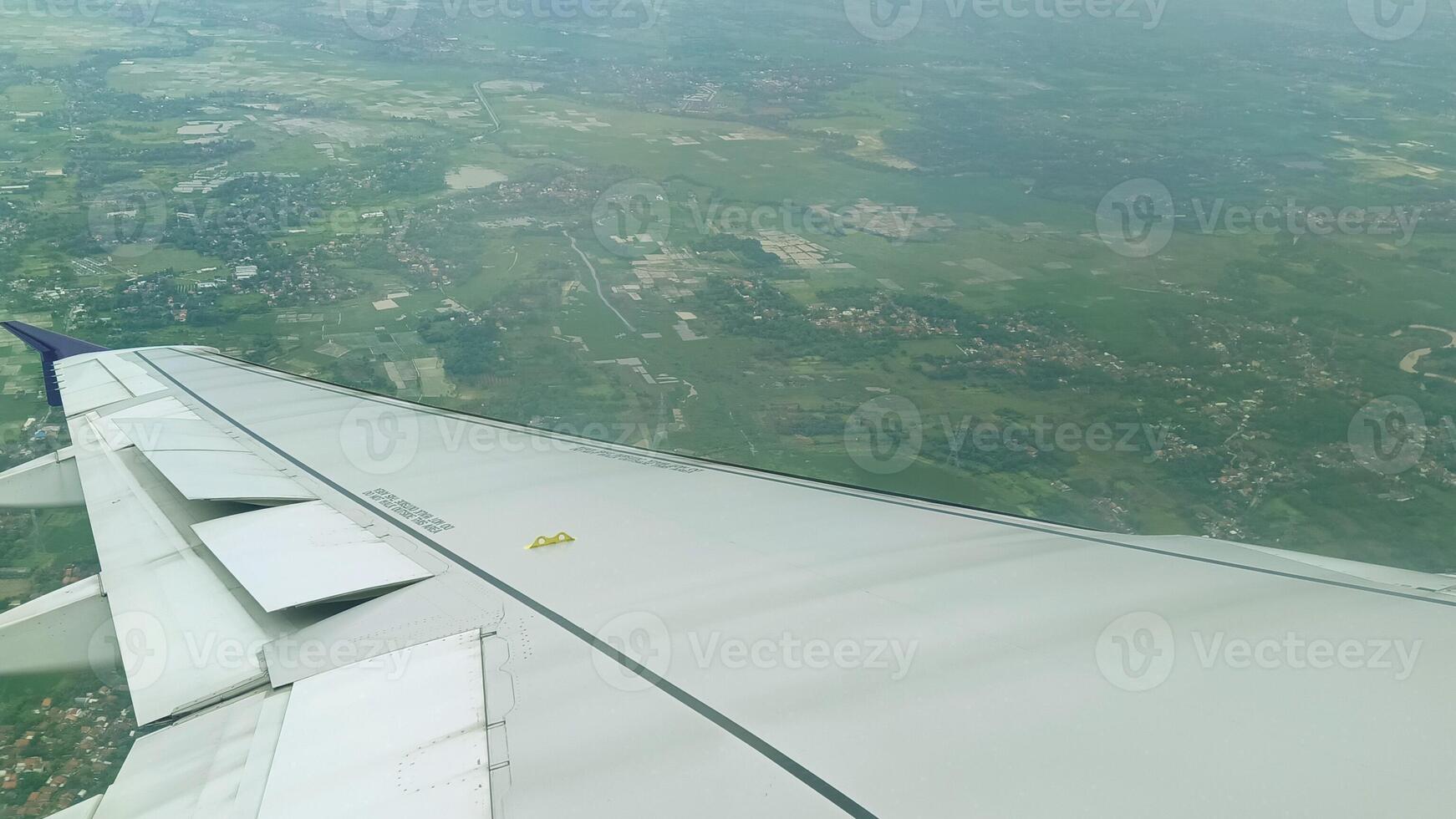The view outside the plane if you look from the window photo