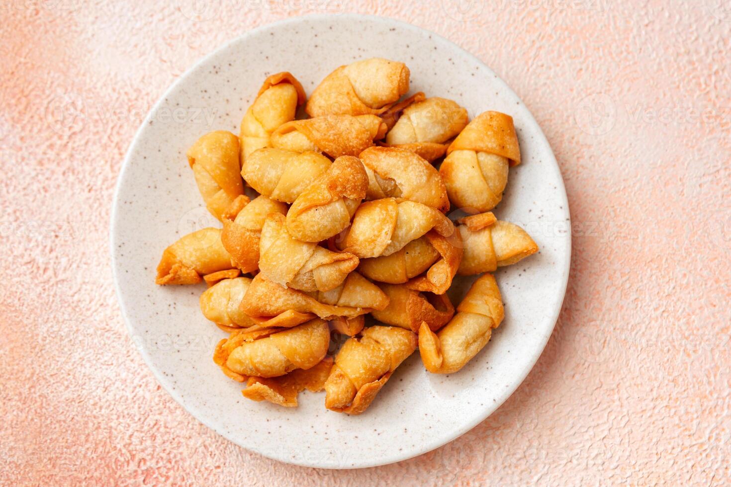 Pisang molen, Indonesian traditional food made from banana wrap with sheet of pastry dough and then fried photo